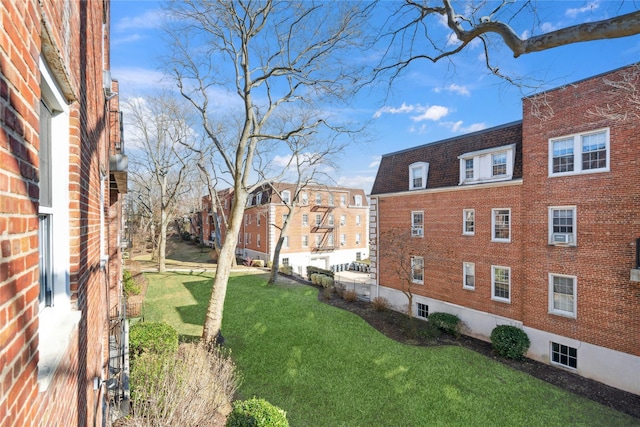 view of yard featuring a residential view