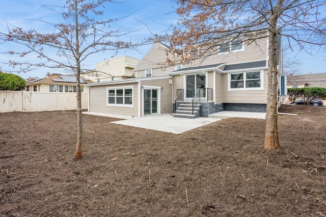 back of property featuring a patio area