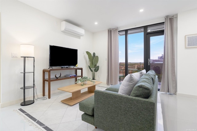 living room with an AC wall unit, light tile patterned flooring, and a wall of windows