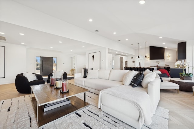 living room featuring light parquet flooring