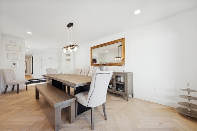 dining area with light parquet floors