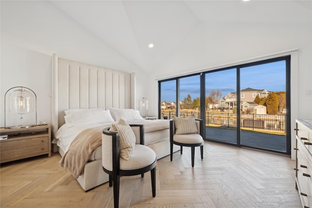 bedroom featuring light parquet floors, high vaulted ceiling, and access to exterior