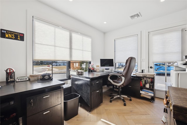 office area with light parquet flooring