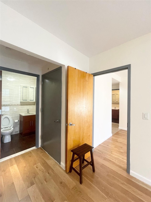 hallway featuring light hardwood / wood-style floors