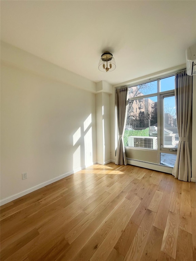 spare room with light wood-type flooring