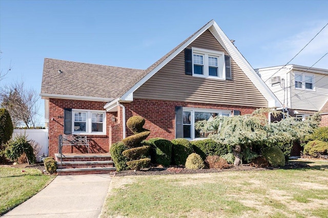 view of front of home with a front yard