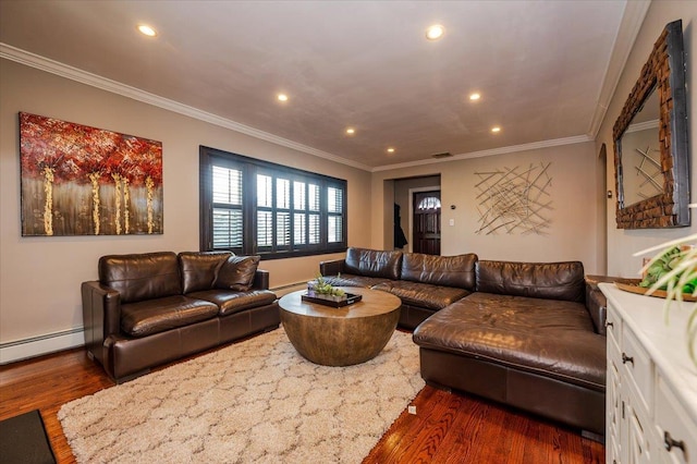 living room featuring baseboard heating, ornamental molding, and dark hardwood / wood-style flooring