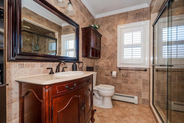 bathroom featuring crown molding, tile walls, vanity, a baseboard radiator, and walk in shower