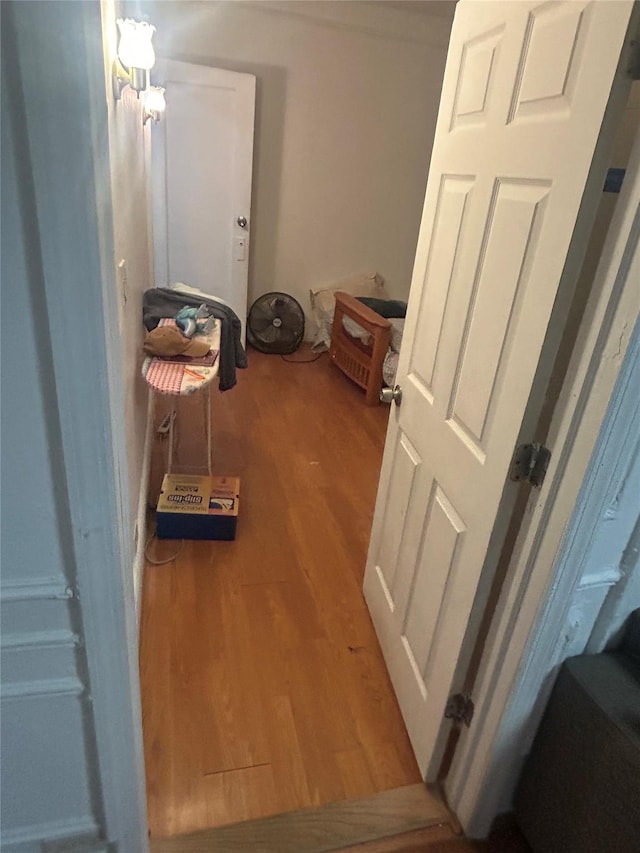 corridor featuring hardwood / wood-style flooring