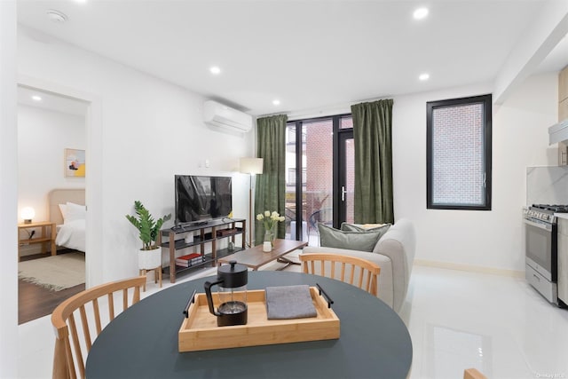 tiled dining space with a wall mounted air conditioner and expansive windows