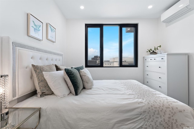 bedroom with a wall mounted AC