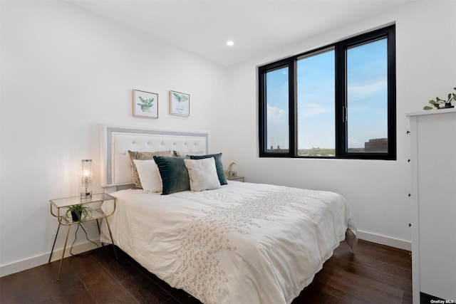 bedroom featuring dark hardwood / wood-style floors