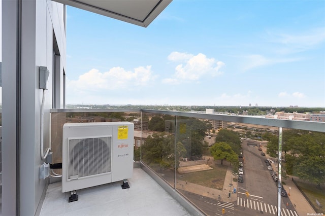 balcony featuring ac unit