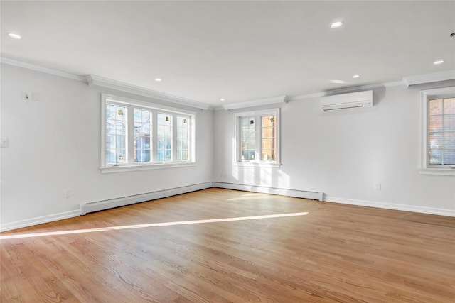 spare room with a baseboard heating unit, light hardwood / wood-style flooring, an AC wall unit, and ornamental molding