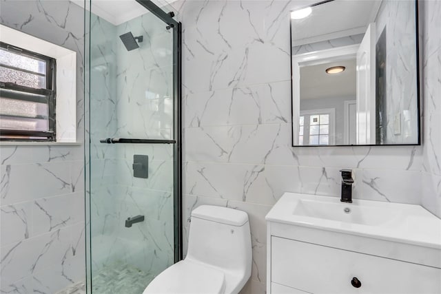 bathroom featuring vanity, a shower with shower door, tile walls, and toilet