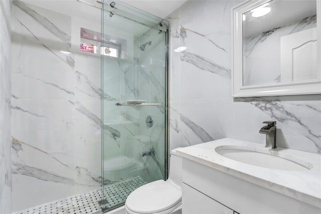 bathroom featuring vanity, decorative backsplash, toilet, tile walls, and a shower with shower door