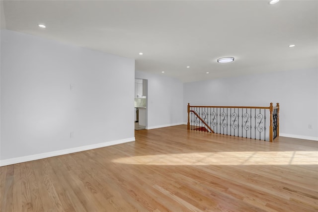 spare room featuring light hardwood / wood-style floors