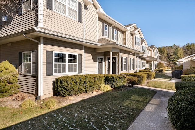 exterior space featuring a lawn