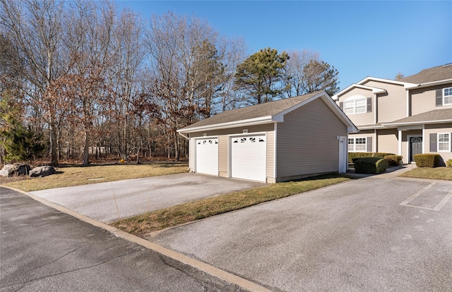 garage with a yard