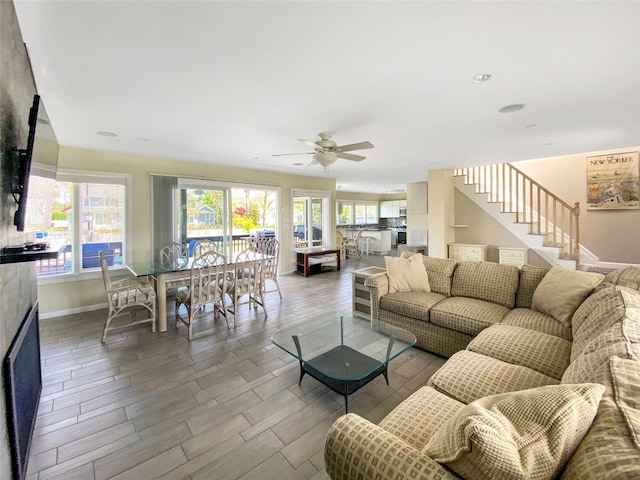 living room featuring ceiling fan