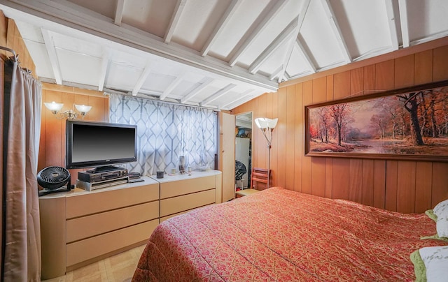 bedroom with a notable chandelier, wooden walls, and vaulted ceiling with beams