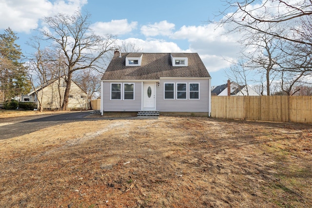 view of new england style home