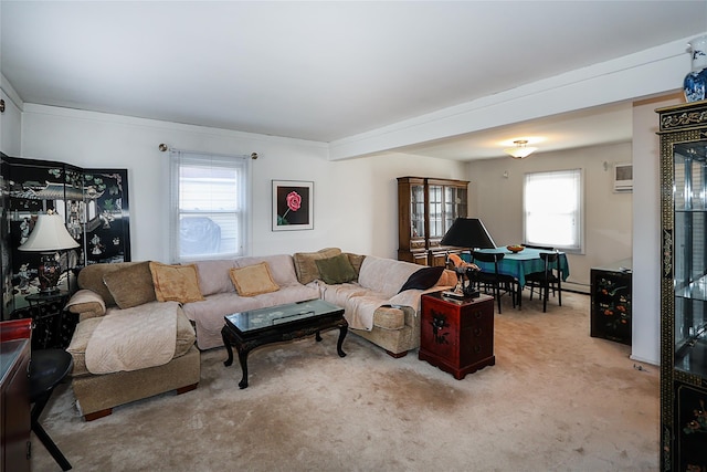 living room featuring a healthy amount of sunlight and light carpet