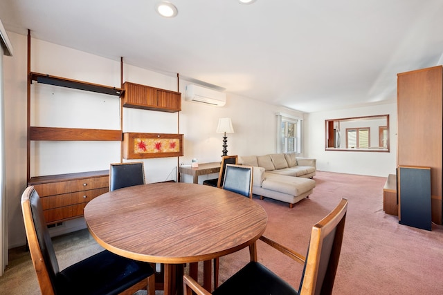 carpeted dining space with a wall unit AC