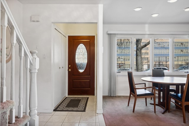 entrance foyer with light tile patterned flooring