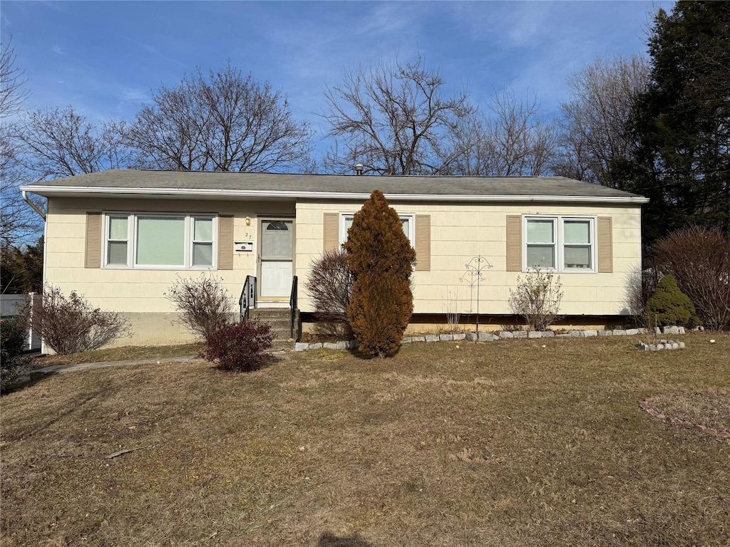 view of front of house with a front lawn