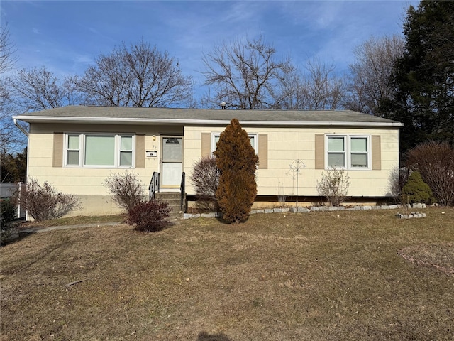 view of front of house with a front lawn