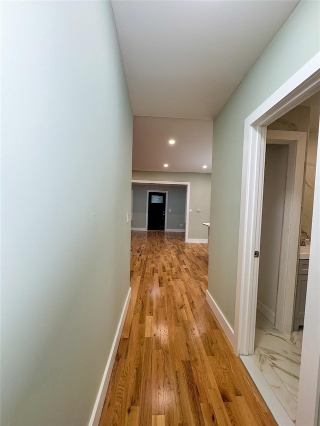 hall featuring light hardwood / wood-style floors