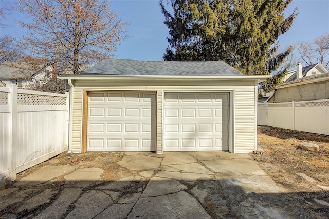 detached garage with fence