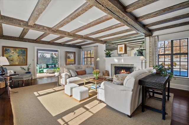 living room with hardwood / wood-style flooring and beam ceiling