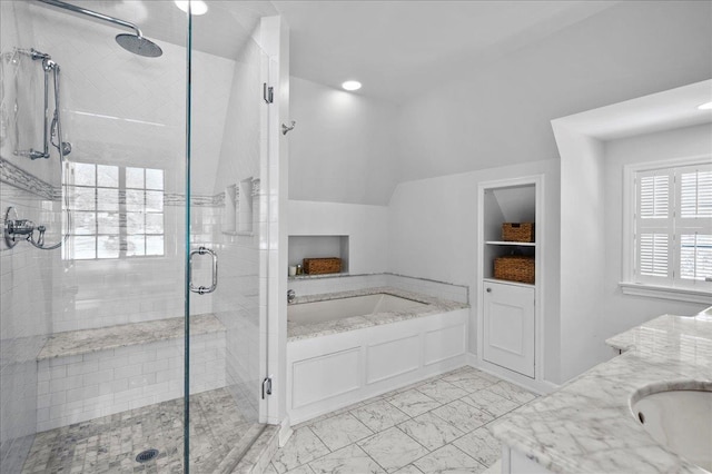 bathroom featuring vanity and walk in shower