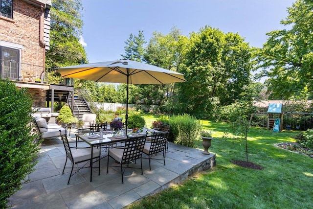 view of patio with a playground