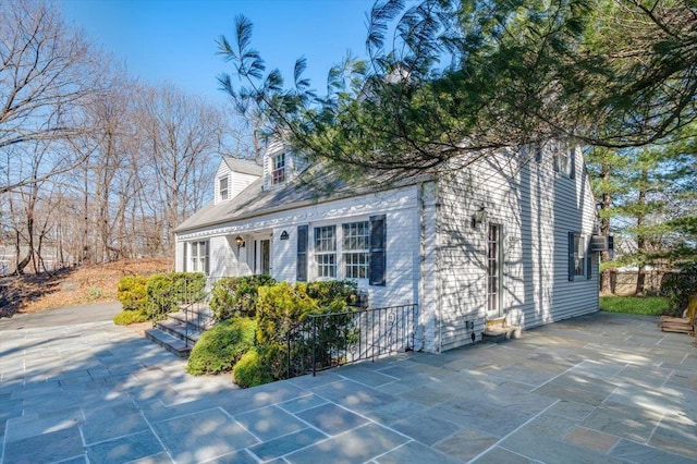 view of front of house with a patio area