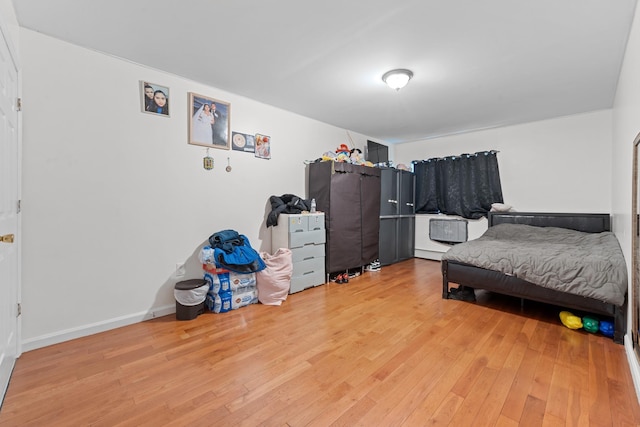 bedroom featuring wood-type flooring