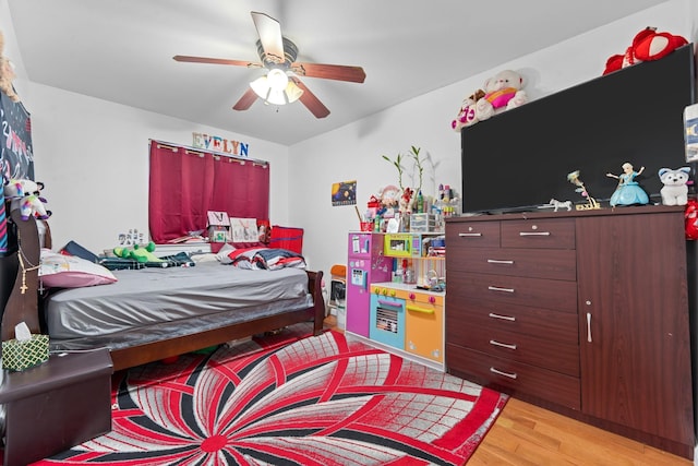 bedroom featuring ceiling fan and light wood-type flooring