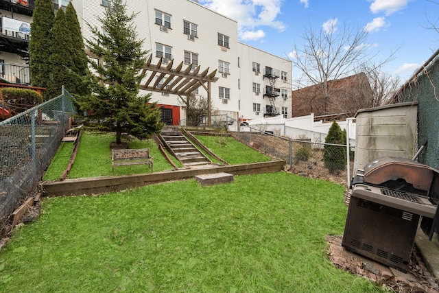 exterior space with a pergola and a yard