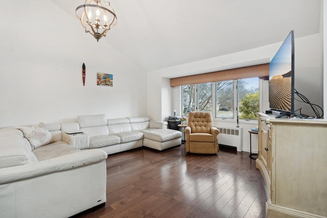 living room featuring a chandelier, radiator heating unit, dark wood-type flooring, and vaulted ceiling