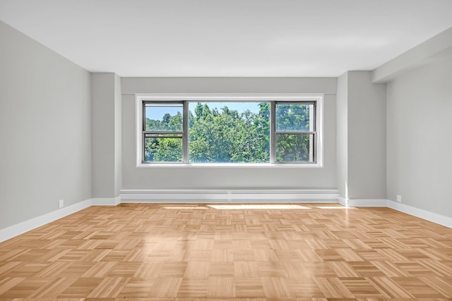 spare room featuring baseboard heating