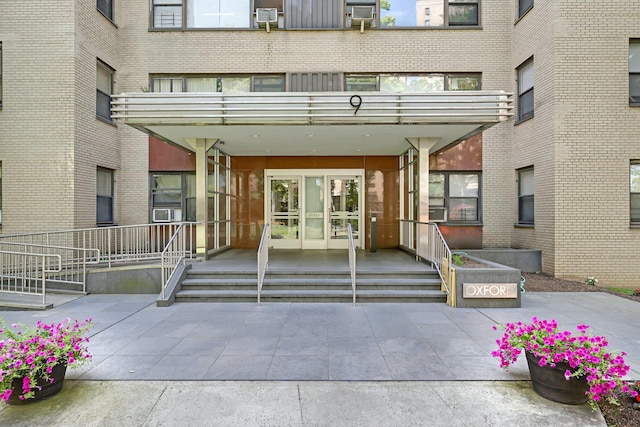 property entrance with a balcony