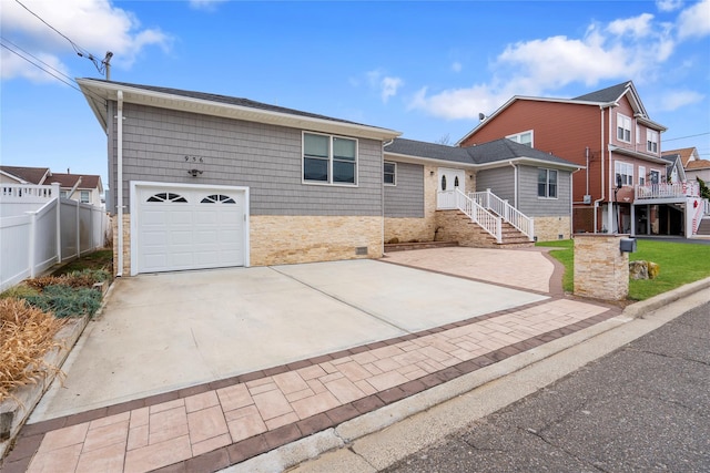 view of front of property featuring a garage