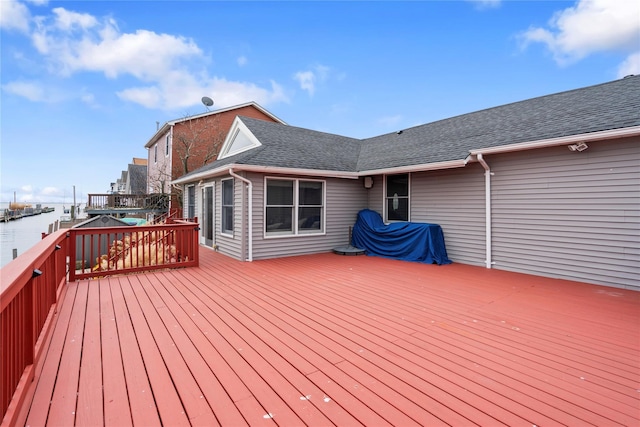 deck featuring a water view