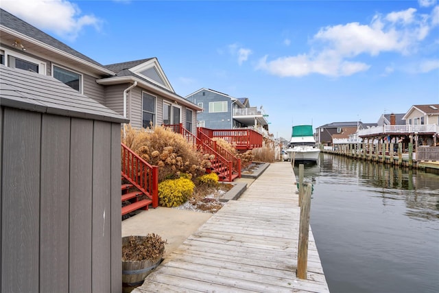 dock area with a water view