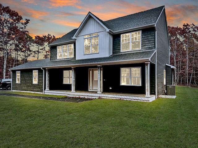 view of front of home with a lawn