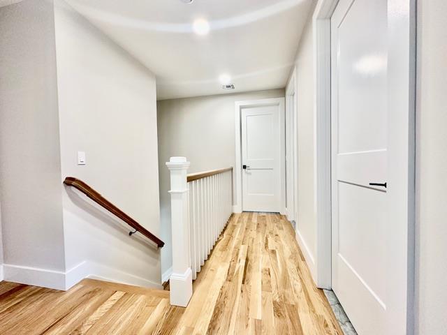 hall featuring light hardwood / wood-style floors