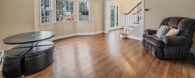 sitting room with hardwood / wood-style flooring