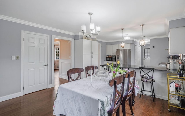 dining space with dark hardwood / wood-style flooring, a notable chandelier, and ornamental molding